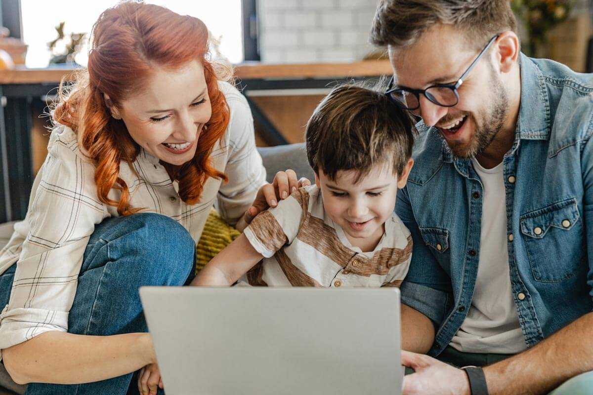 A family using a wireless internet by New Lisbon Broadband & Communications